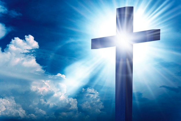 cross sign surrounded by clouds