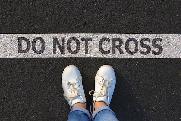 Photo do not cross text on road