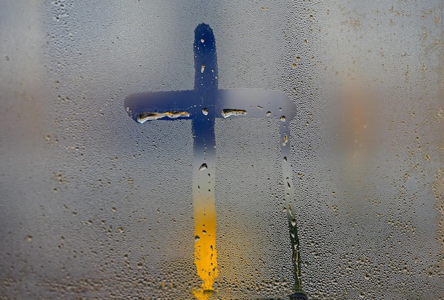 cross on the window