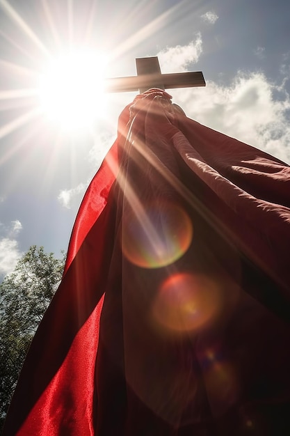 Foto una croce con il sole che splende su di essa