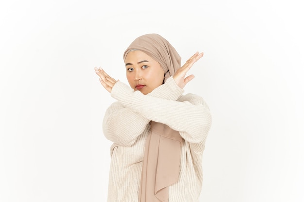 Crossed arms and rejection gesture of Beautiful Asian Woman Wearing Hijab Isolated On White Background