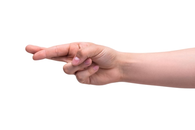 Crossed fingers gesture on the hand Isolated on white wall closeup