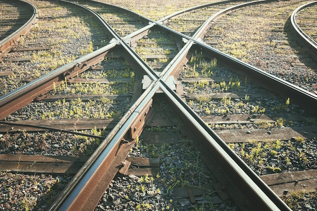 Photo crossing of the old railway tracks, toned.