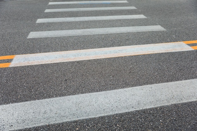 A crosswalk on a road with a crosswalk.