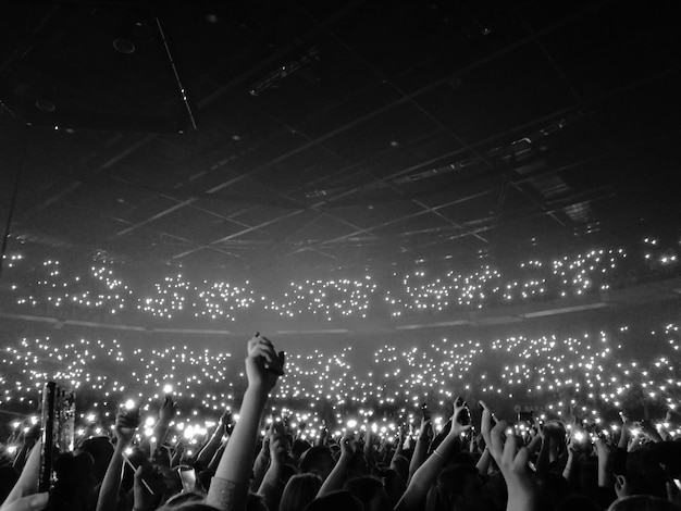 Photo crowd at music festival at concert hall