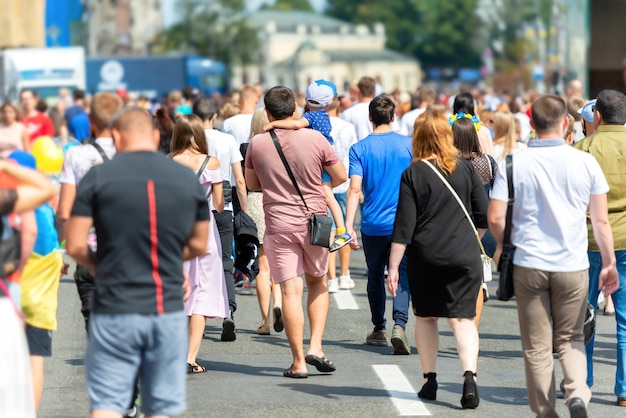 Crowd of people on city street