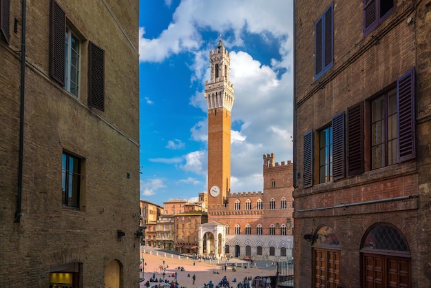 Crowd of people in Piazza del Campo square in Siena, Italy