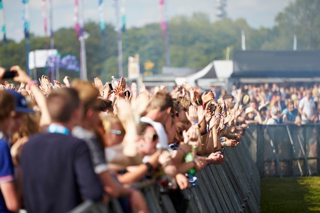 Crowds Enjoying Themselves At Outdoor Music Festival