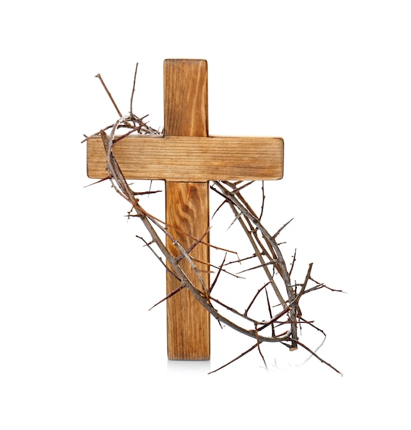 Crown of thorns and wooden cross on white background