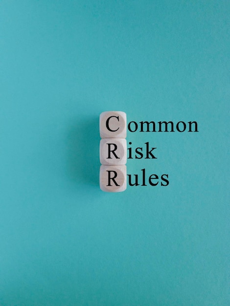 Crr common risk rules symbol concept blue words crr common risk rules on wooden cubes