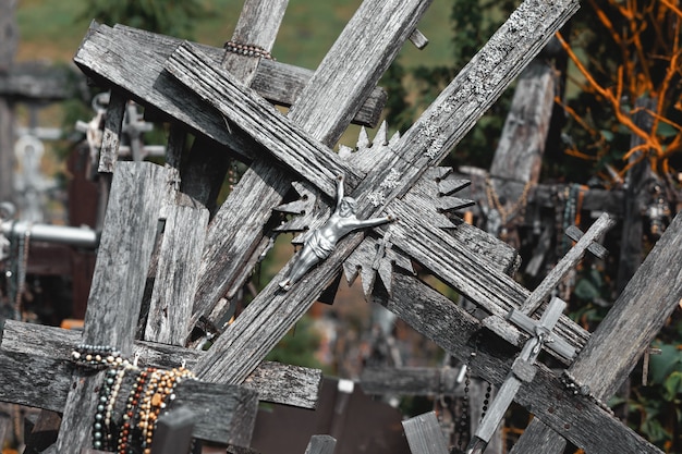 Crucifixion of Christ and a large number of crosses at Hill of Crosses. Hill of Crosses is a unique monument of history and religious folk art in Siauliai, Lithuania.