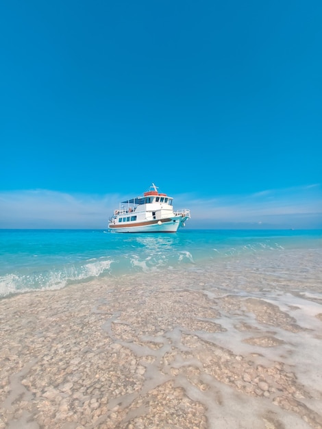 Cruise boat at egremni beach greece vacation lefkada island