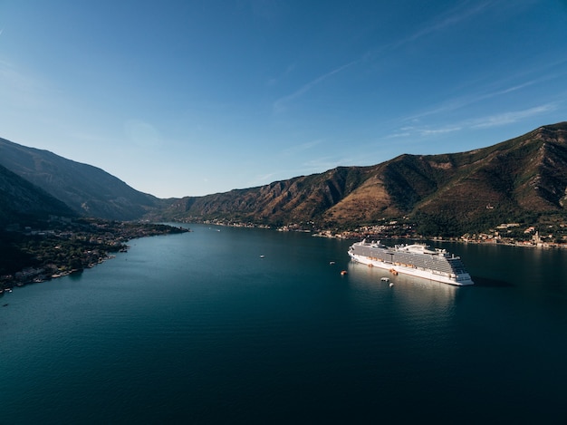 Cruise liner at dawn in kotor bay near the old town of kotor in boka kotorska montenegro