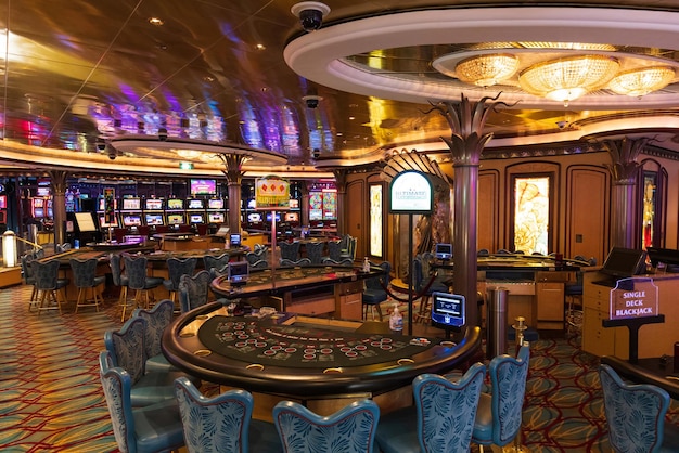 Cruise ship casino gambling blackjack and slot machines waiting for tourist to spend money