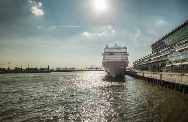 cruise ship sailing in sea against sky
