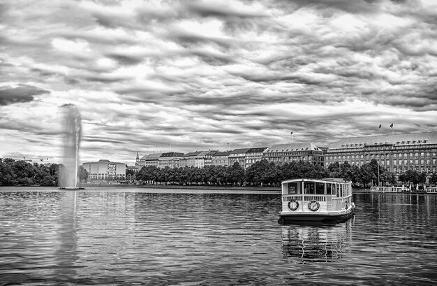 Cruiser boat float on river water in hamburg germany