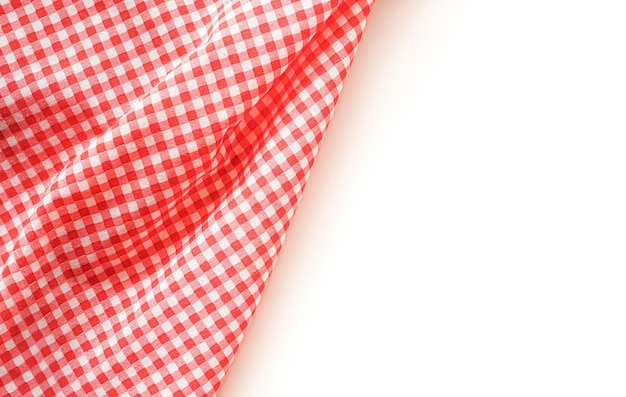 Photo crumble pink plaid fabric or tablecloth on white background with copy space