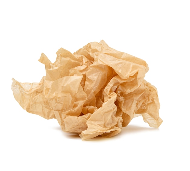 Crumpled ball of brown sheet of parchment paper isolated on white surface, element for designer