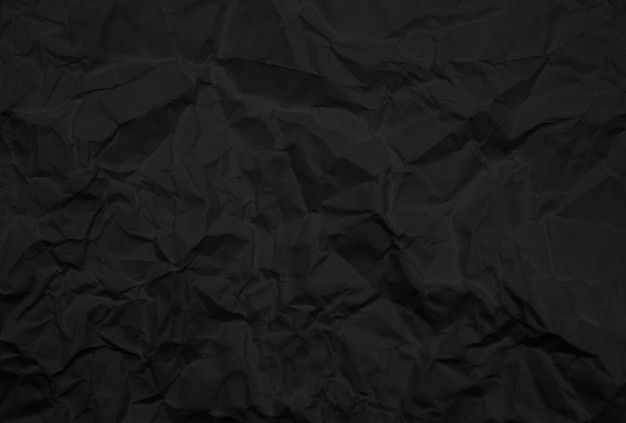 Crumpled black paper for background image