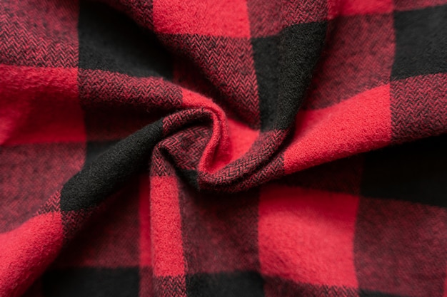 Crumpled Black and Red Fabric in a Cage