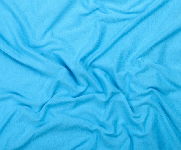 Photo crumpled blue cotton fabric