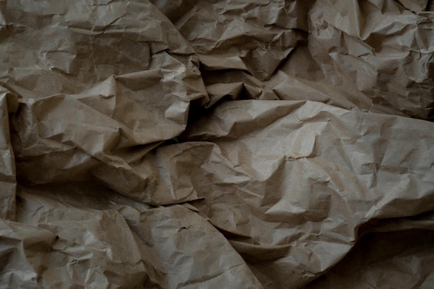 Crumpled brown kraft paper background closeup of crumpled kraft
paper