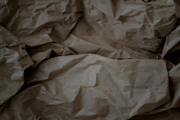 Crumpled brown kraft paper background closeup of crumpled kraft
paper