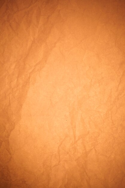 Crumpled brown paper background.