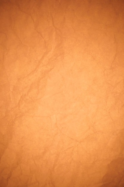 Crumpled brown paper background.