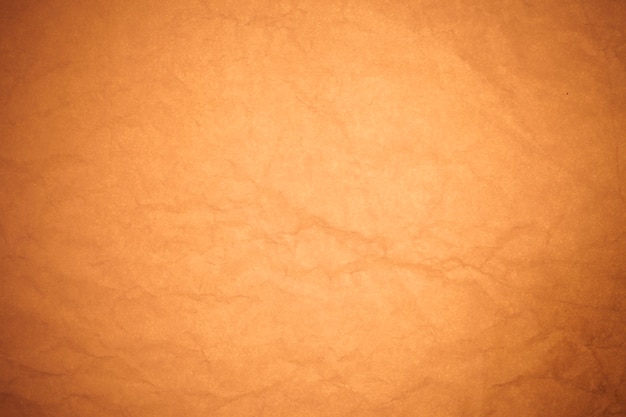 Crumpled brown paper background.