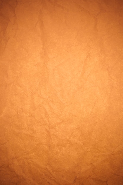 Crumpled brown paper background.