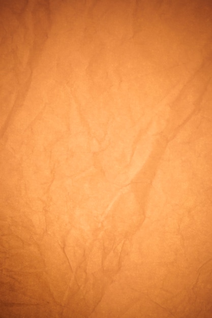 Crumpled brown paper background.