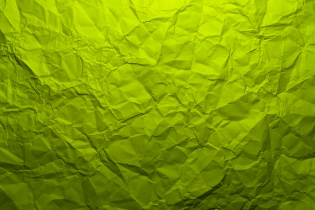 Crumpled green paper texture background