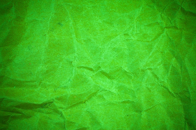 Crumpled green paper texture.