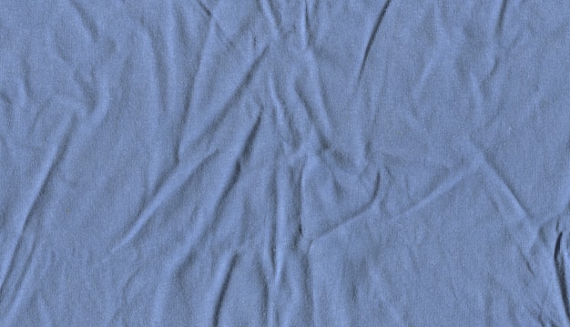 Crumpled light blue fabric texture