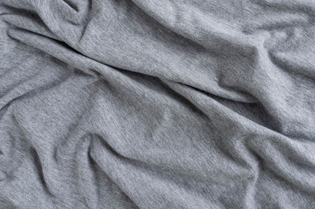 Photo crumpled linen cloth texture. wrinkled textile. grey.