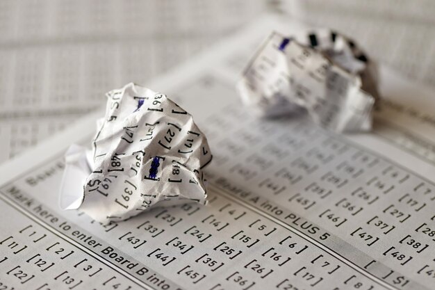 Crumpled lottery tickets as symbol of losing the lottery game Unlucky gambling results Misfortune