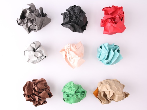 Crumpled paper against a white background.