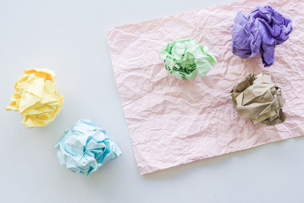 Crumpled paper balls on floor