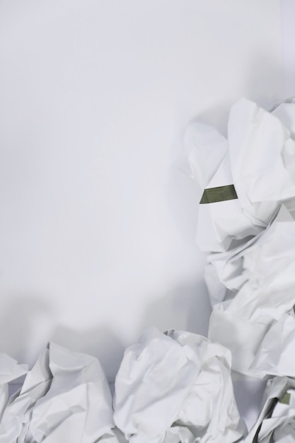 crumpled paper on white background with blank copyspace