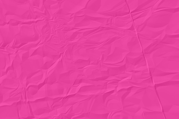 Crumpled pink paper background close up