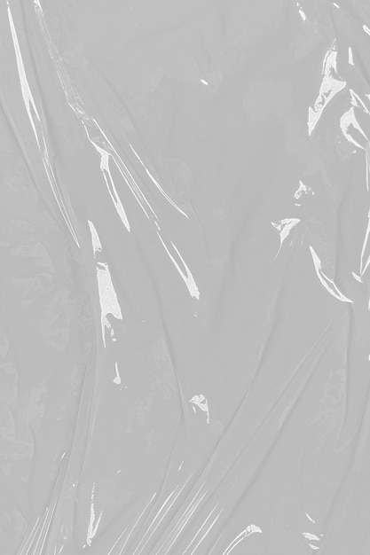 crumpled plastic warp grunge plastic wrap on white background texture transparent stretched film polyethylene