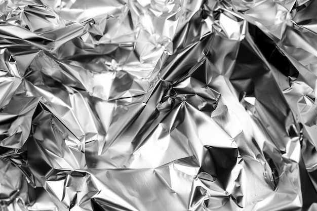 Crumpled up silver foil background