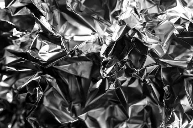 Crumpled up silver foil background