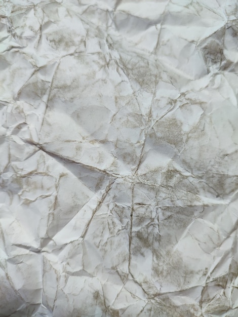 Crumpled white paper texture pattern background