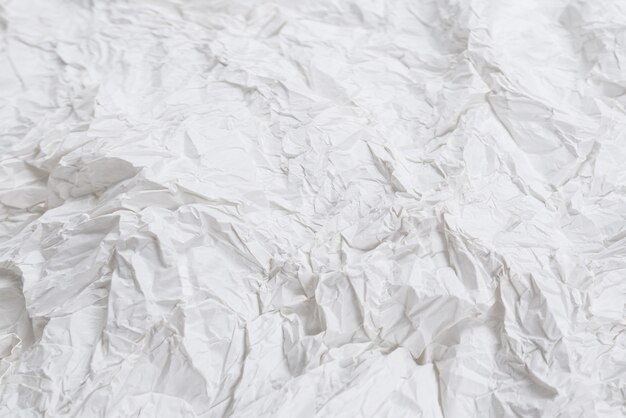 Crumpled white paper.