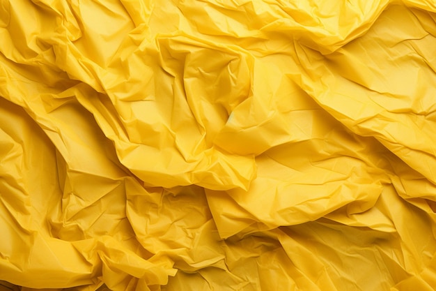 Crumpled yellow paper texture yellow background