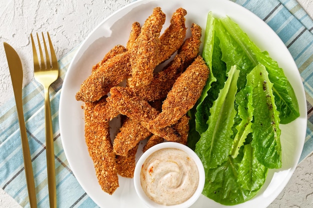 Crunchy Baked Chicken Tenders on a plate