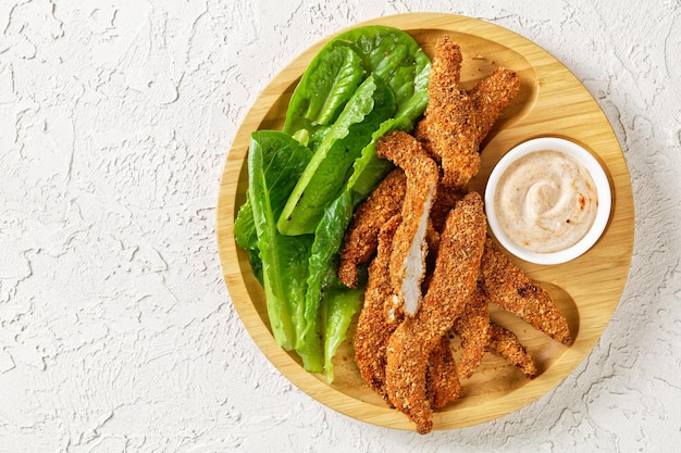 Crunchy Baked Chicken Tenders on a plate