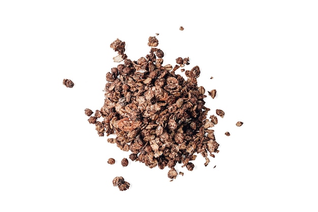 Crunchy chocolate granola pile isolated on white background